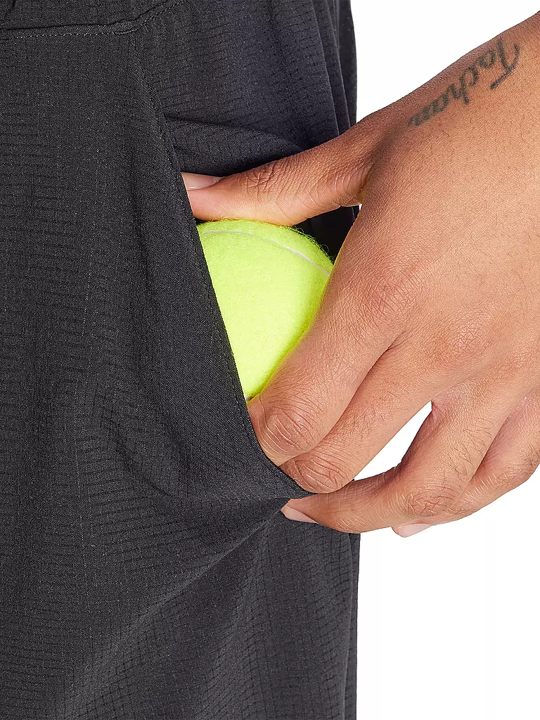 ADIDAS | Pantalón corto de tenis Ergo 7in para hombre |