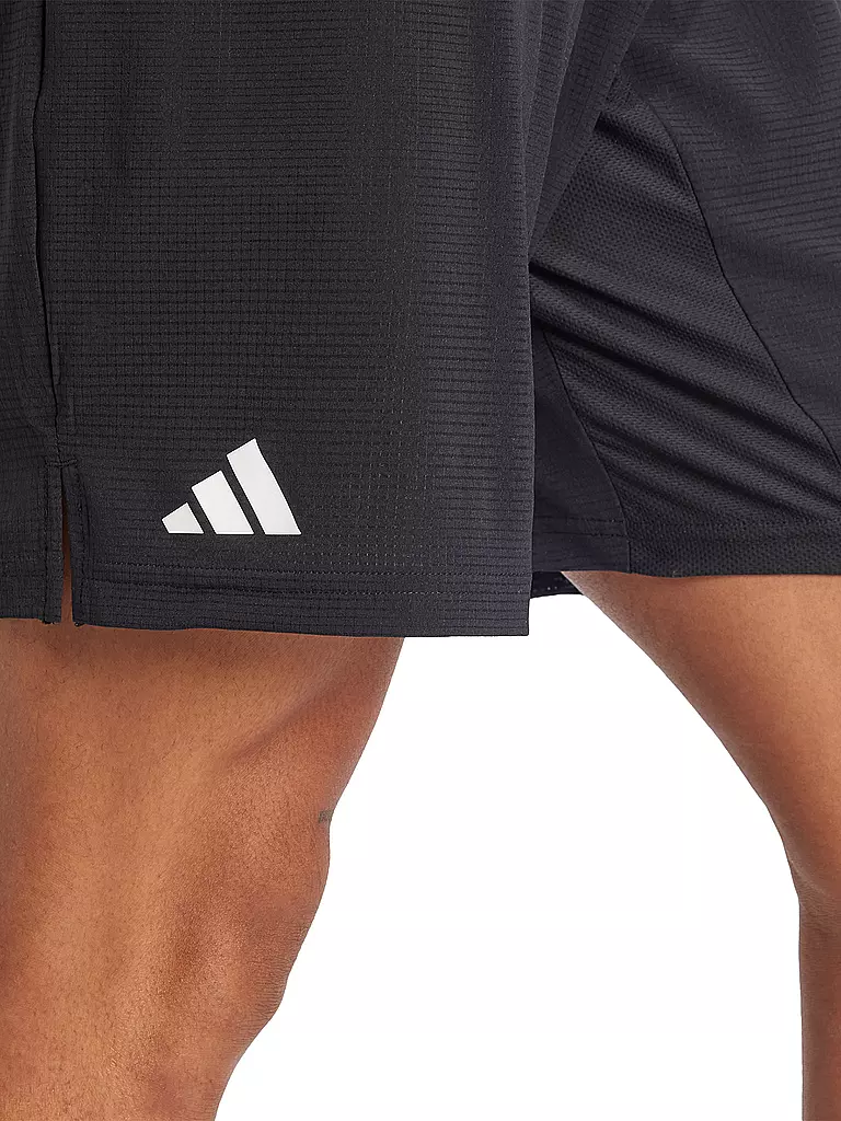 ADIDAS | Pantalón corto de tenis Ergo 7in para hombre |