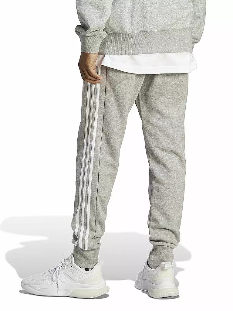 ADIDAS | Pantalón de chándal para hombre Essentials French Terry con puños cónicos y 3 rayas | Gris