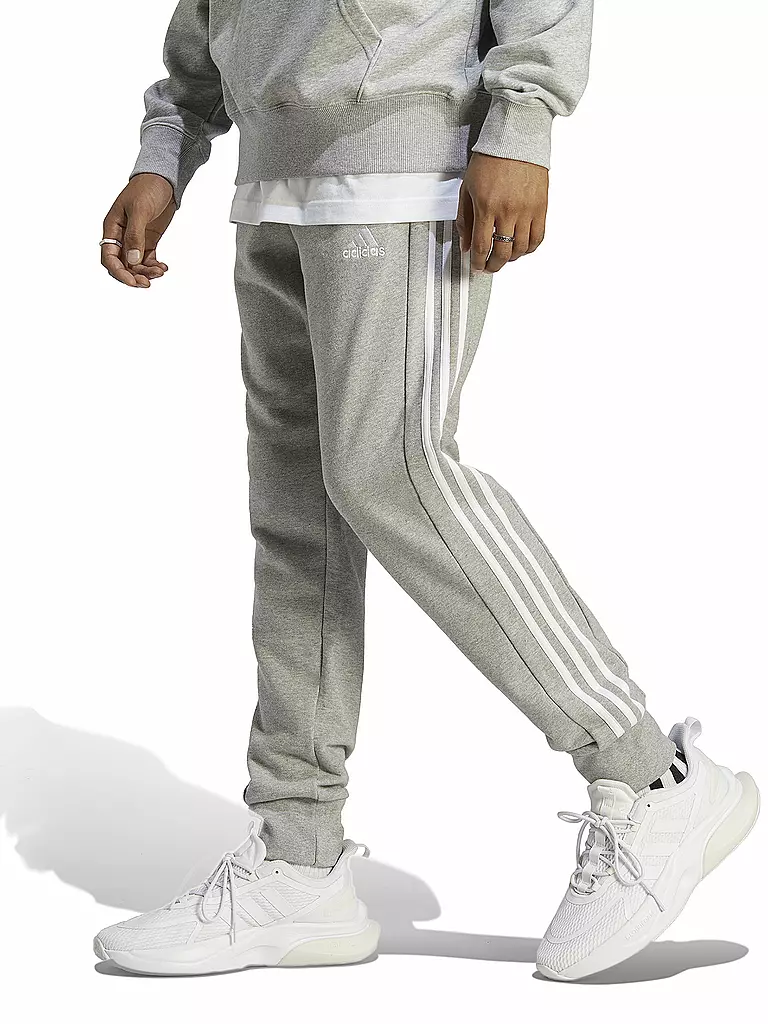 ADIDAS | Pantalón de chándal para hombre Essentials French Terry con puños cónicos y 3 rayas | Gris