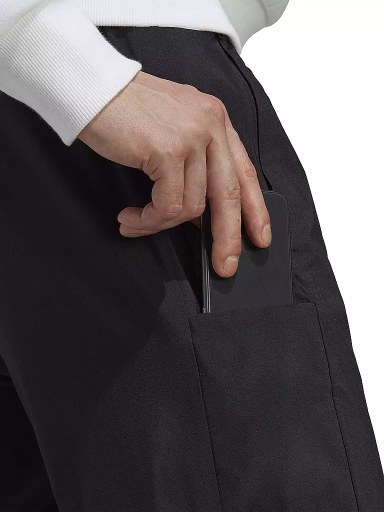 ADIDAS | Pantalón de hombre AEROREADY Essentials Stanford con dobladillo abierto y logo pequeño bordado |