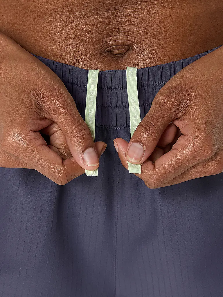 ASICS | Pantalón corto de running para mujer Nagino Run Adjustable de 4 pulgadas |