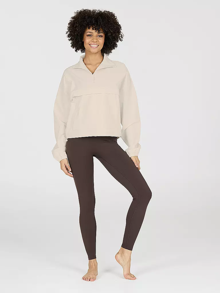 ATHLECIA | Suéter de mujer Carley con cremallera de 1/2 | Crema