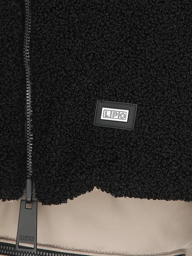 LPO | Chaleco reversible Mascho para mujer |