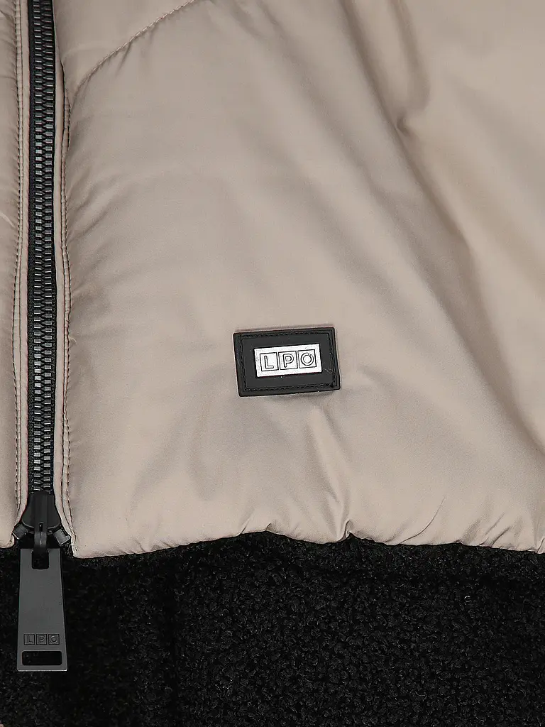 LPO | Chaleco reversible Mascho para mujer |