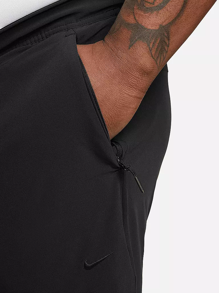 NIKE | Pantalón de fitness Unlimited para hombre |