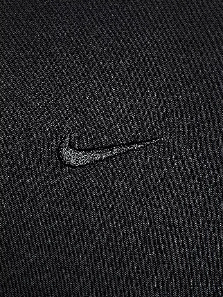 NIKE | Sudadera con capucha Primary para hombre |