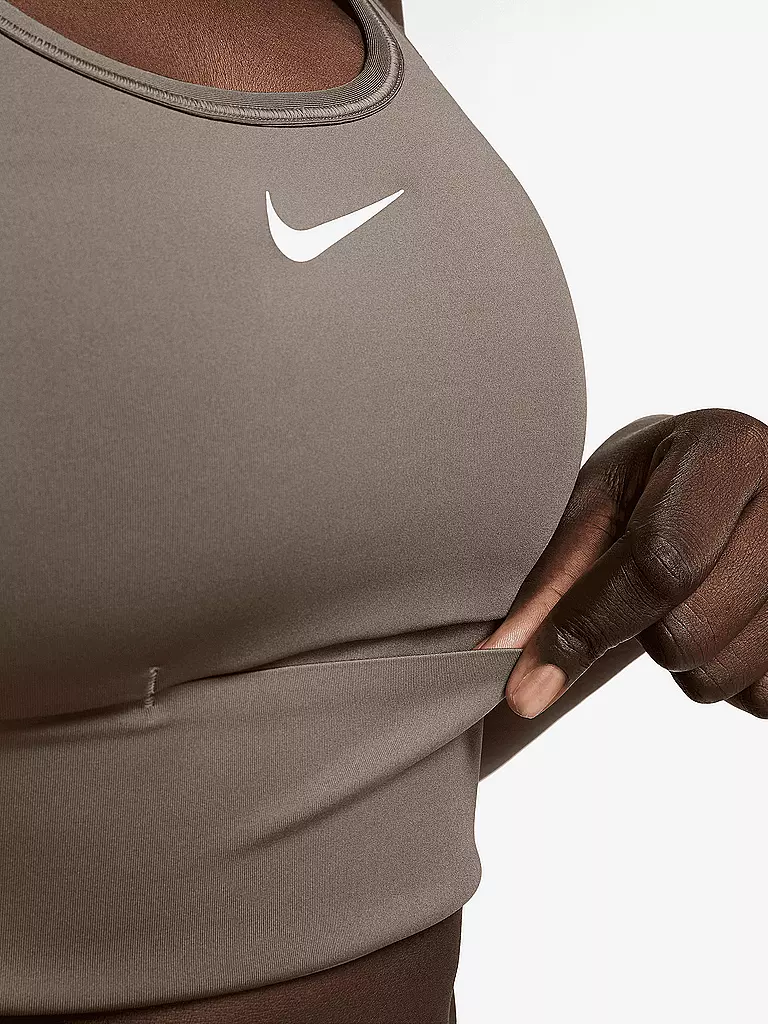 NIKE | Sujetador deportivo para mujer Swosh Longline de sujeción media | 