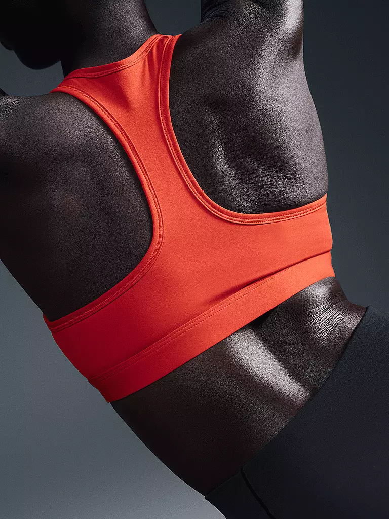 NIKE | Sujetador deportivo Swoosh de sujeción media para mujer |