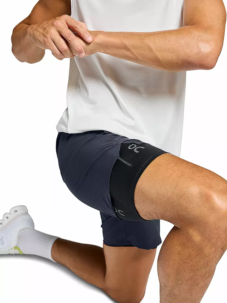 ON | Pantalón corto de running 2 en 1 Performance Hybrid para hombre |