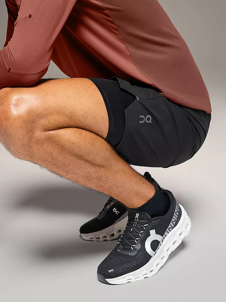 ON | Pantalón corto de running 2 en 1 Performance Hybrid para hombre |