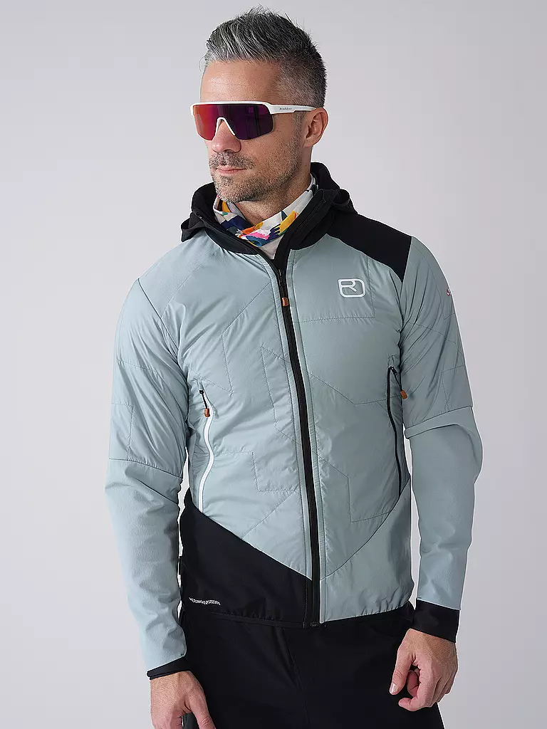 ORTOVOX | Chaqueta híbrida para hombre Col Becchei con capucha | Azul claro