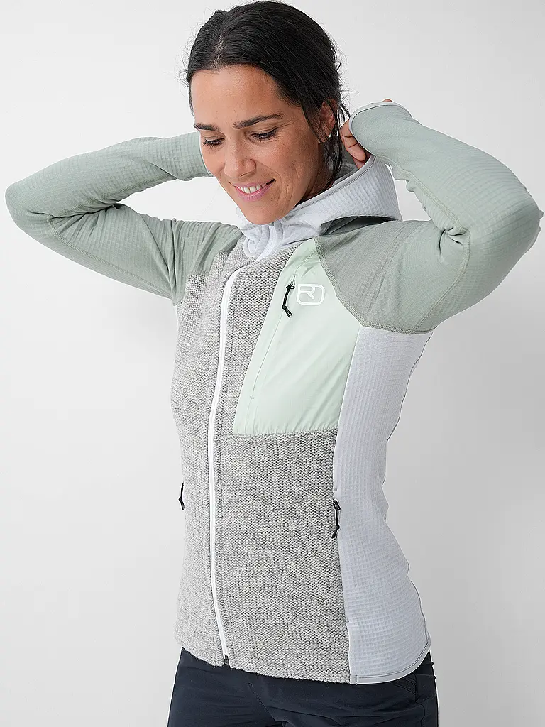 ORTOVOX | Chaqueta polar con capucha de punto clásico para mujer |