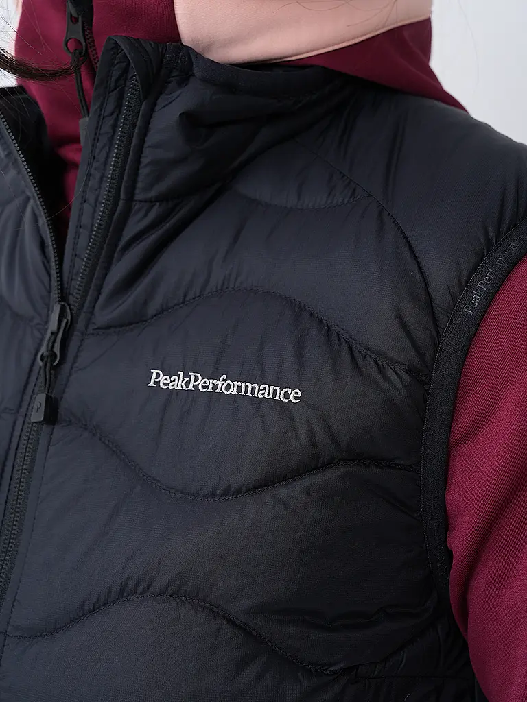 PEAK PERFORMANCE | Chaleco de plumas Helium para mujer |