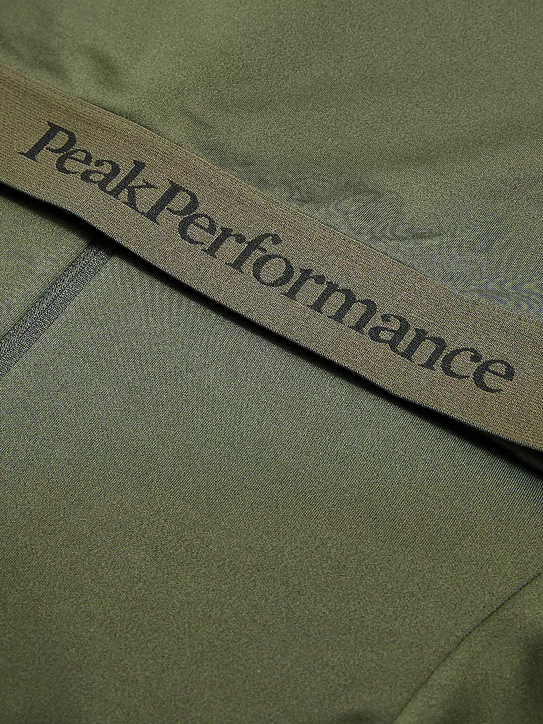 PEAK PERFORMANCE | Chaqueta interior con cremallera y capucha Rider Tech para mujer |
