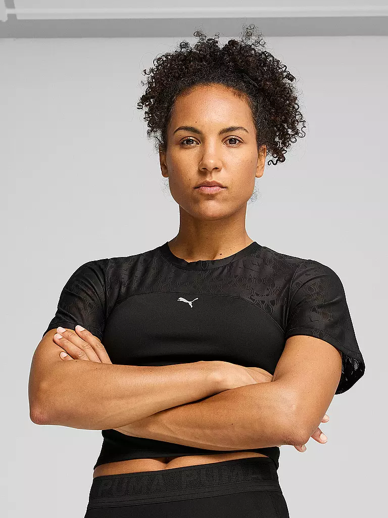 PUMA | Camiseta de fitness corta con encaje para mujer |