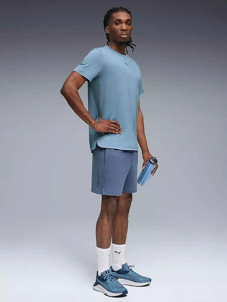 PUMA | Camiseta de fitness para hombre CLOUDSPUN BRANDED | Azul claro