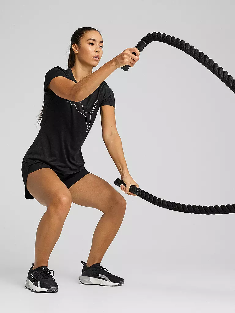 PUMA | Camiseta de fitness para mujer Essential Heather Logo | Negro