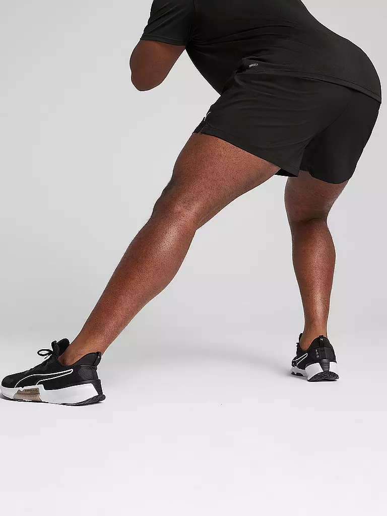 PUMA | Pantalón corto de fitness Essential Woven de 5 pulgadas para hombre |