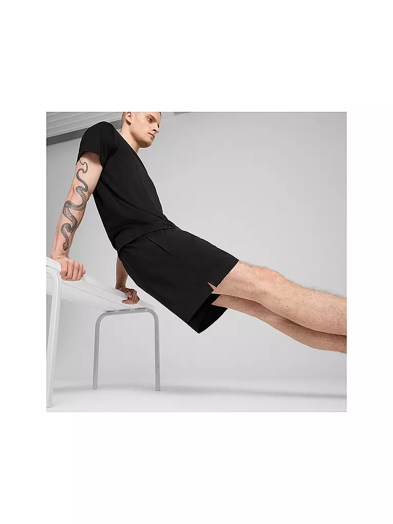 PUMA | Pantalón corto de fitness Essential Woven de 5 pulgadas para hombre |