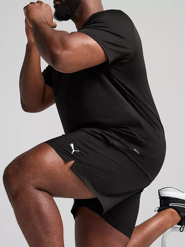 PUMA | Pantalón corto de fitness Essential Woven de 5 pulgadas para hombre |