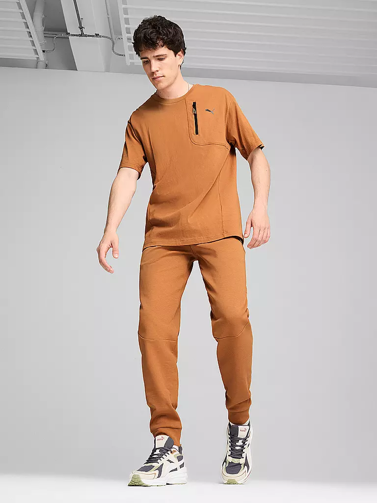 PUMA | Pantalón de chándal para hombre RAD/CAL DK CL | Mostaza