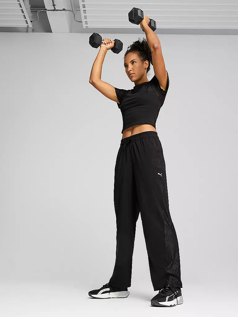 PUMA | Pantalones de fitness Lace Woven para mujer | Negro